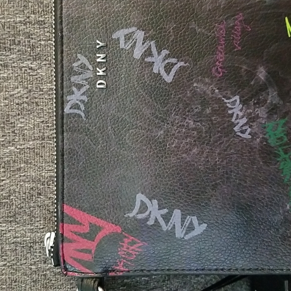 Nwt DKNY medium black graffiti wristlet. Retails $78 - Picture 3 of 9